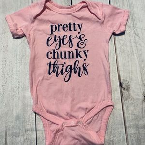 thick thighs and pretty eyes onesie